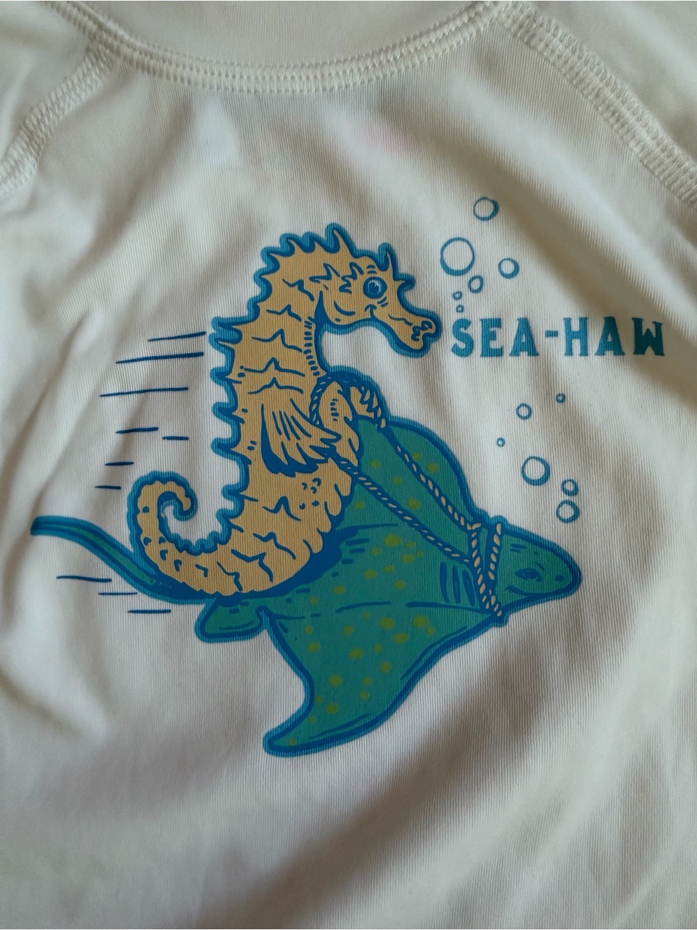 chubbies White Rashguard with Blue & Tan Seahorse Graphic
